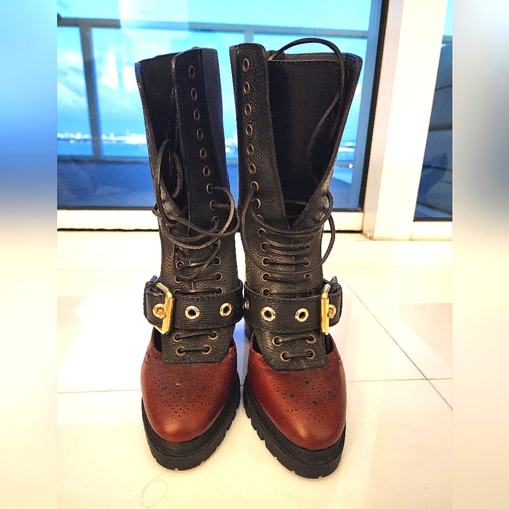 Burberry platform lug sole lace up boot; red snake and peekaboo detail. …